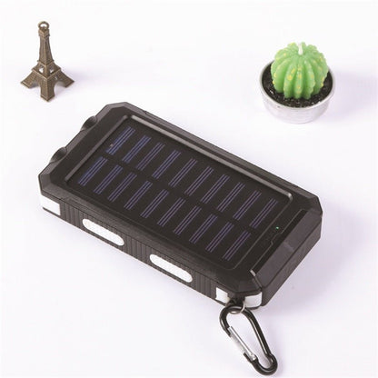 couleur Blanco — SolarGo™ – Batería Externa Solar con Doble Linterna LED, Antigolpes y Mosquetón