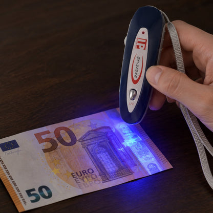 situation — Mini Detector de Billetes Falsos UV Portátil